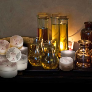 burri-e-creme-con-ampolle-d'olio-nela-stanza-ayurveda